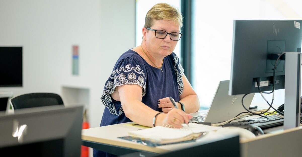 a person sitting at a desk