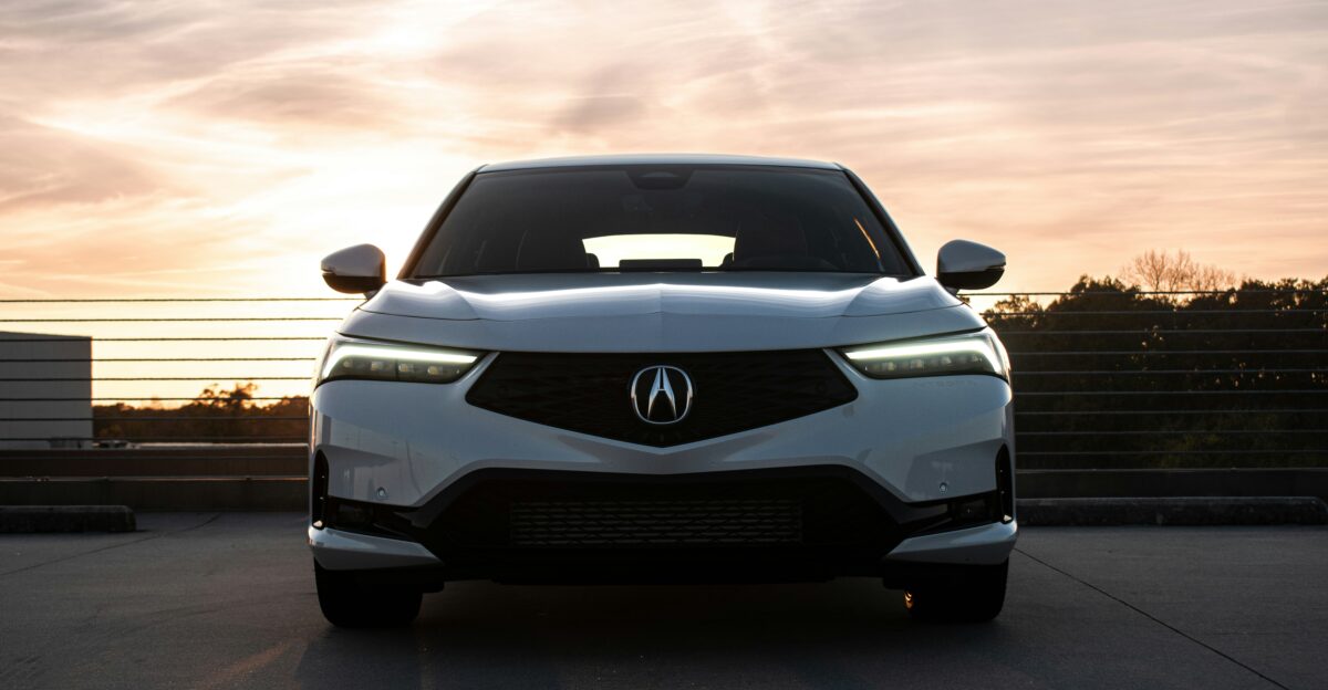 a white car parked on a street