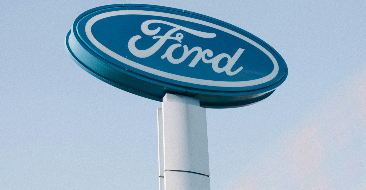 a ford sign is shown against a blue sky