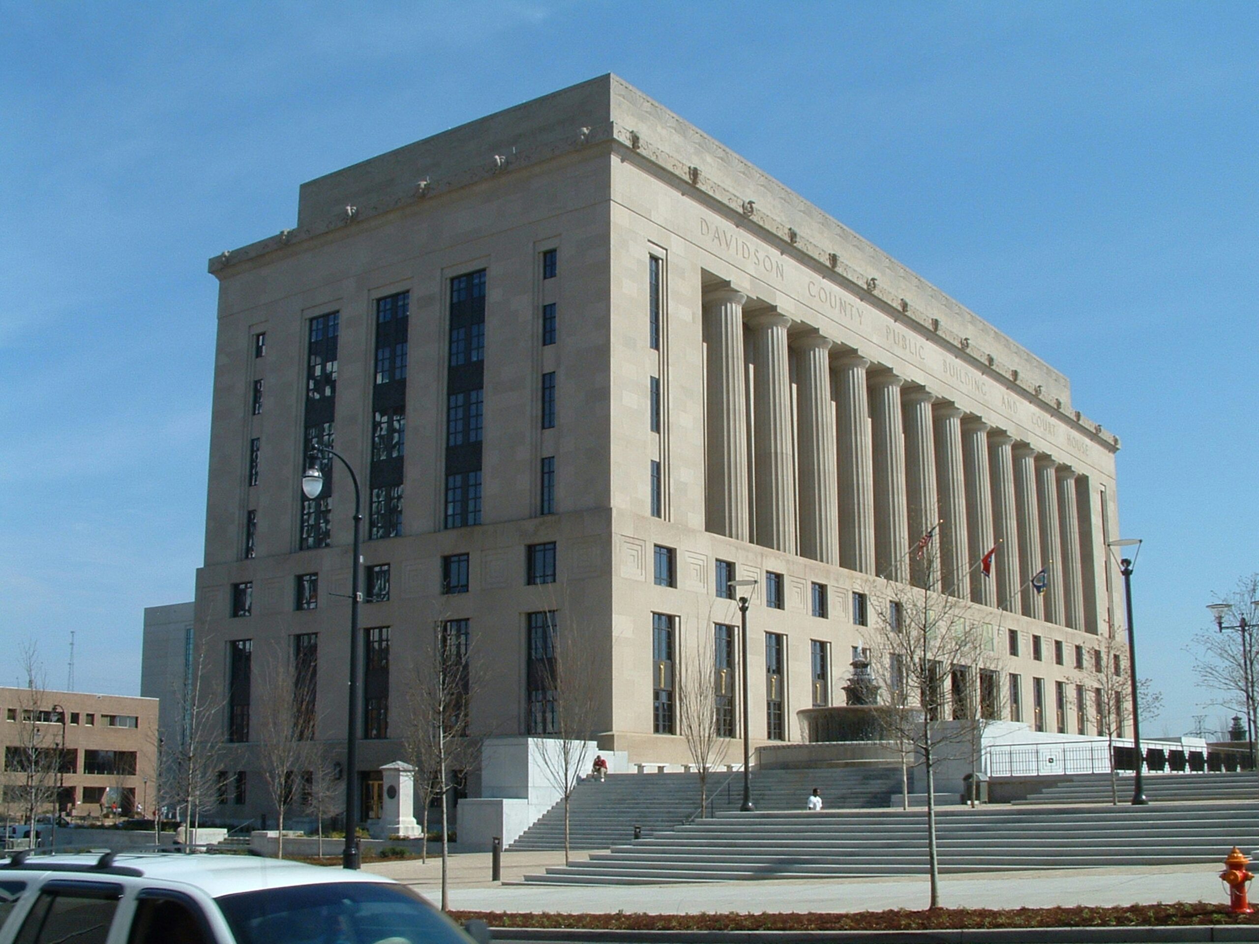 a large building with a clock on the front of it