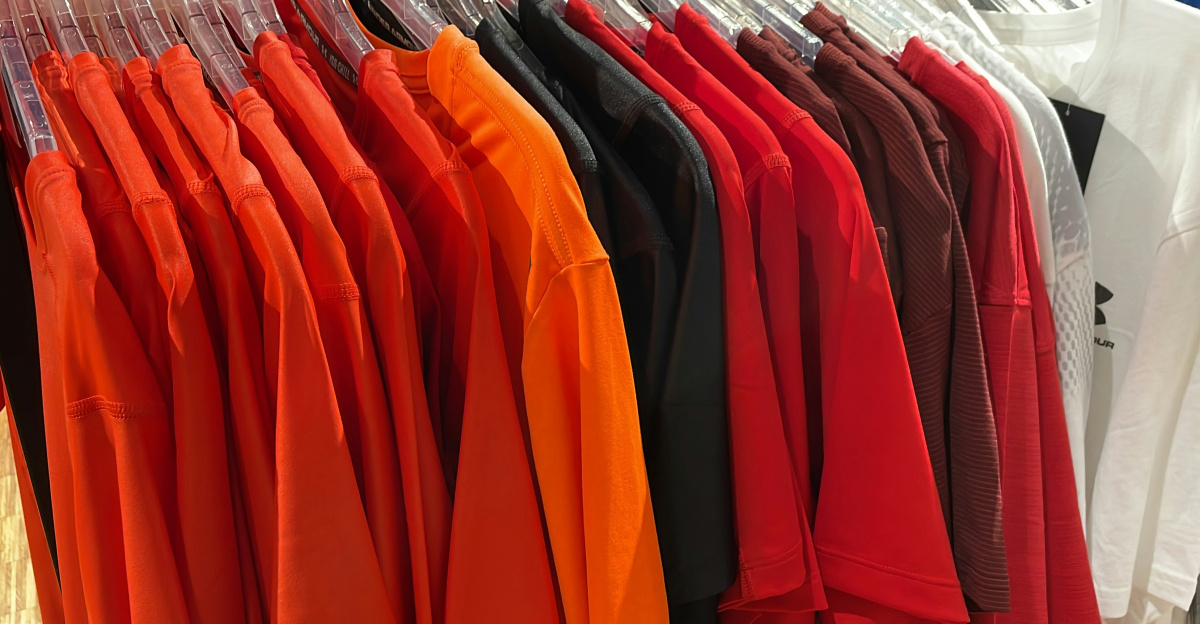 a rack of shirts hanging in a store