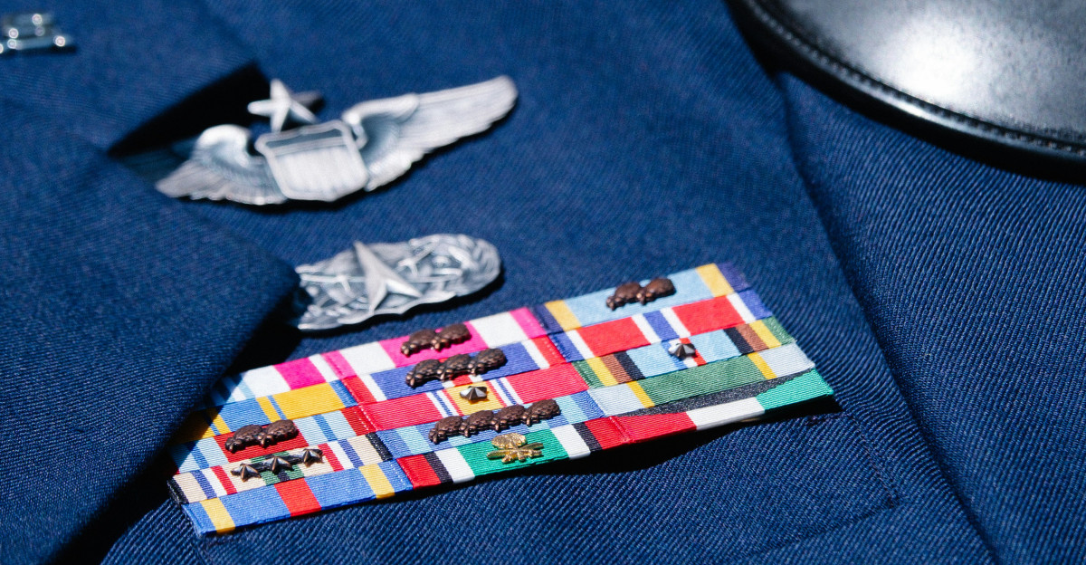 a close up of a uniform with a hat on top of it