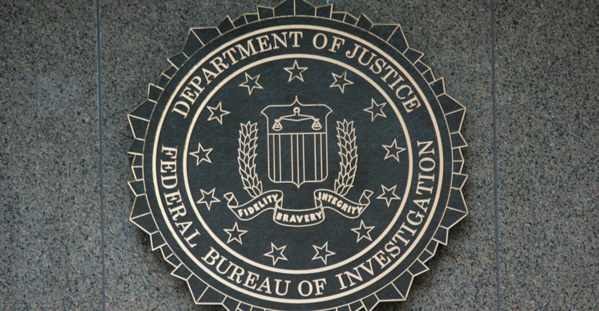 the seal of the department of justice on a wall