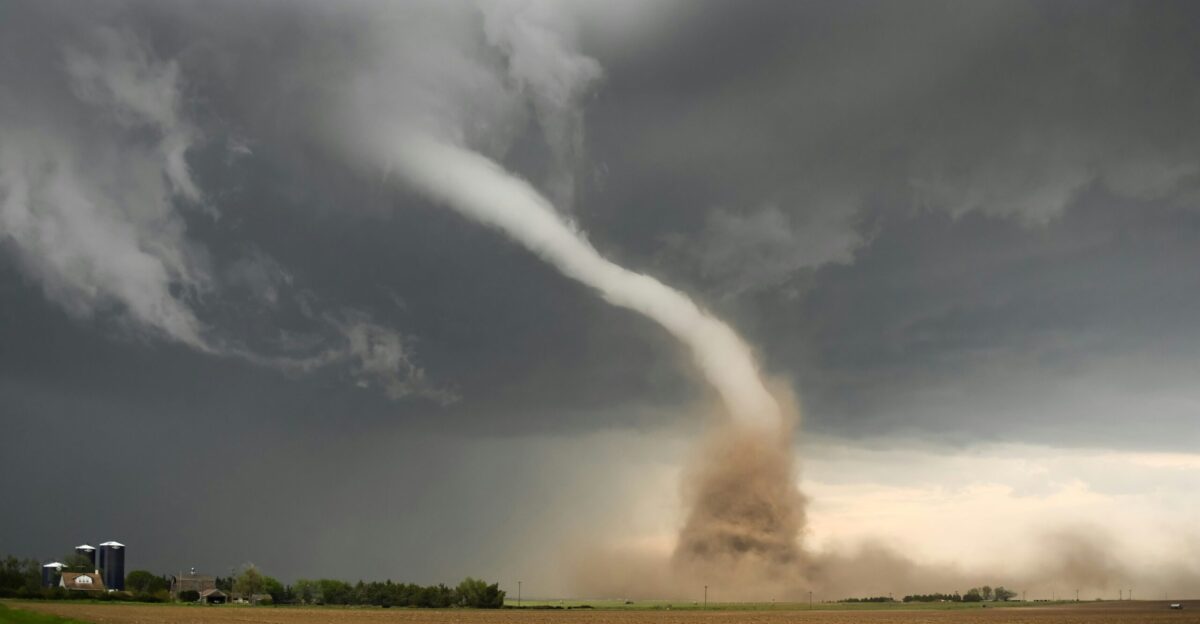 a large tornado is coming out of the sky