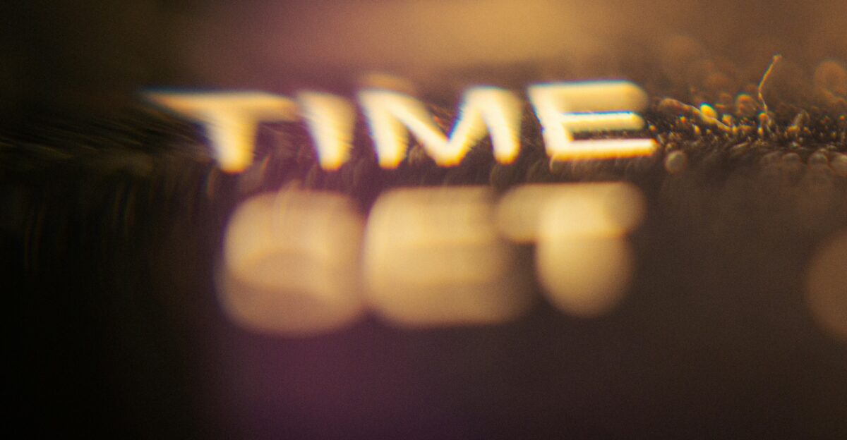 a close up of the word time on a keyboard