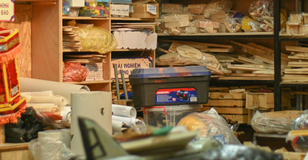 a room filled with lots of boxes and shelves