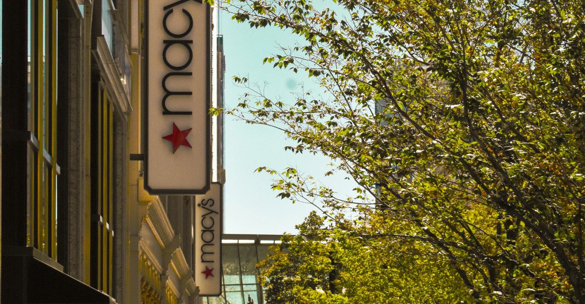 a couple of people that are walking down a sidewalk