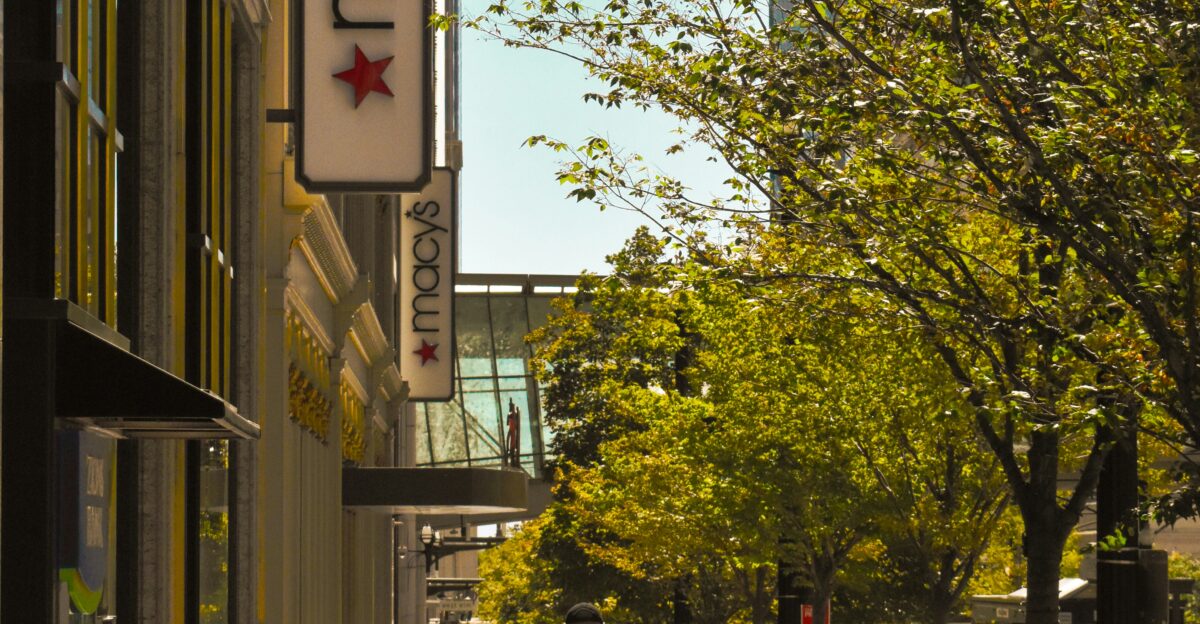 a couple of people that are walking down a sidewalk