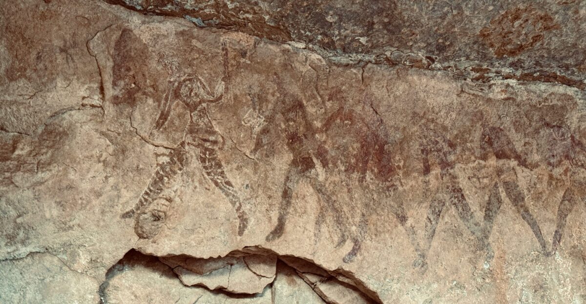 a large rock with some animals on it