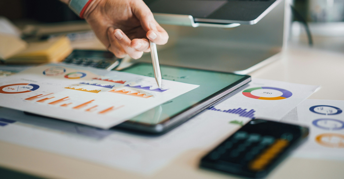 a person is writing on a piece of paper