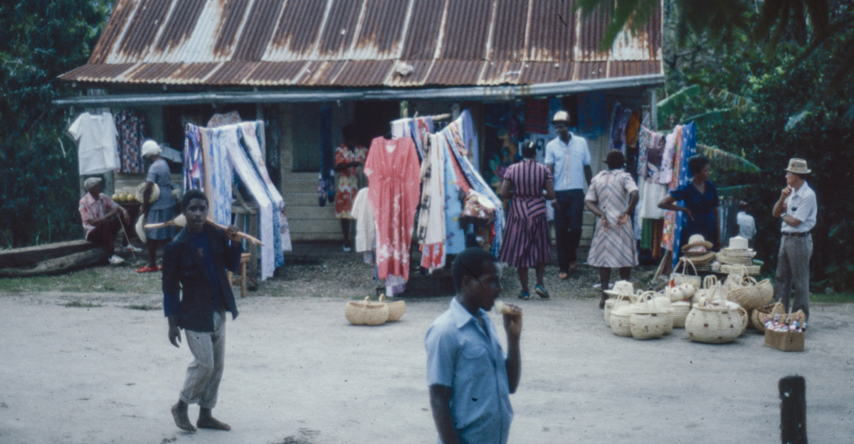 a group of people standing in front of a building