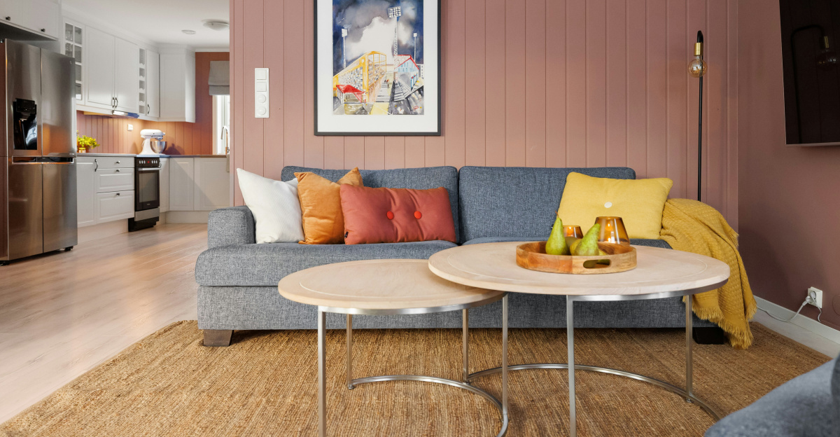 A living room filled with furniture and a flat screen TV
