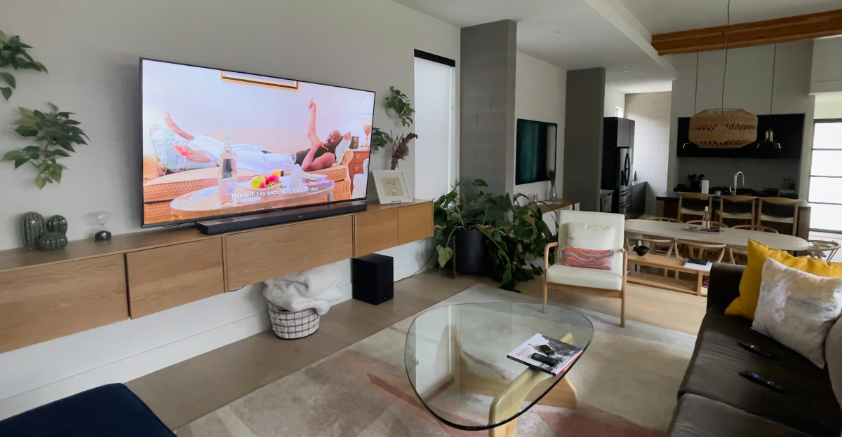 A living room filled with furniture and a flat screen TV