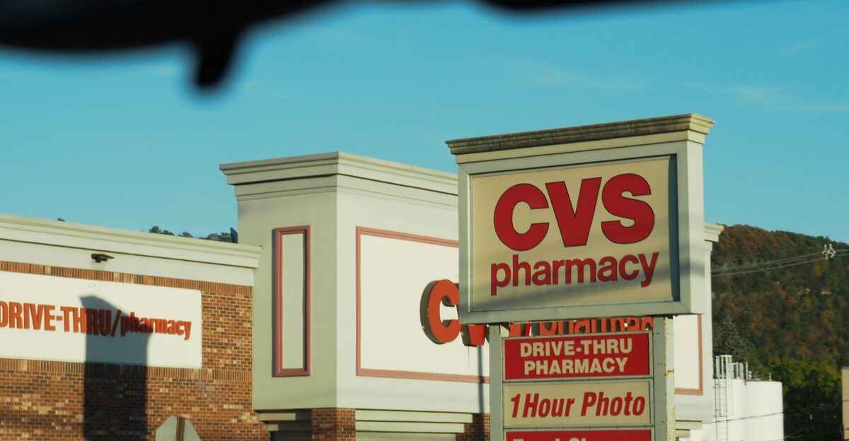 A cv s pharmacy sign in front of a store