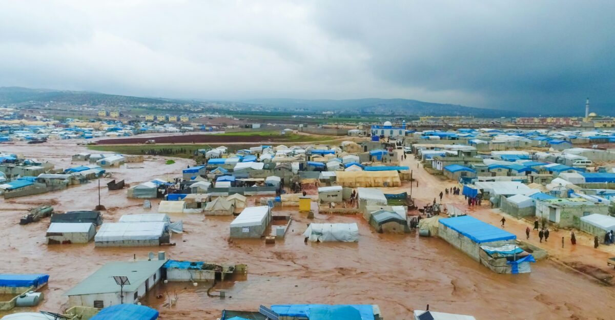 A large group of tents in the middle of a field