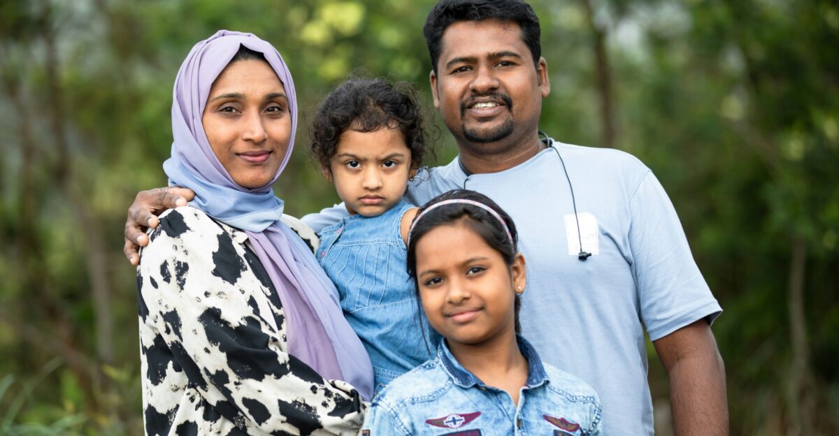 A group of people standing next to each other