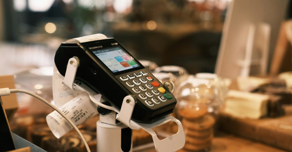 A cell phone is hooked up to a charger