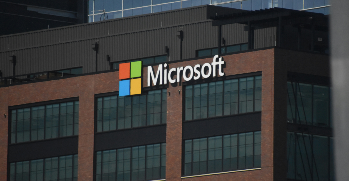 A tall building with a microsoft logo on top of it