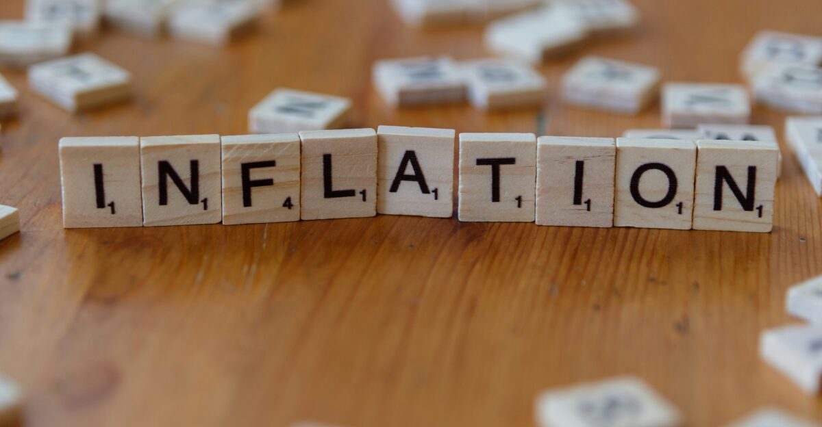 Inflation is spelled out using scrabble tiles