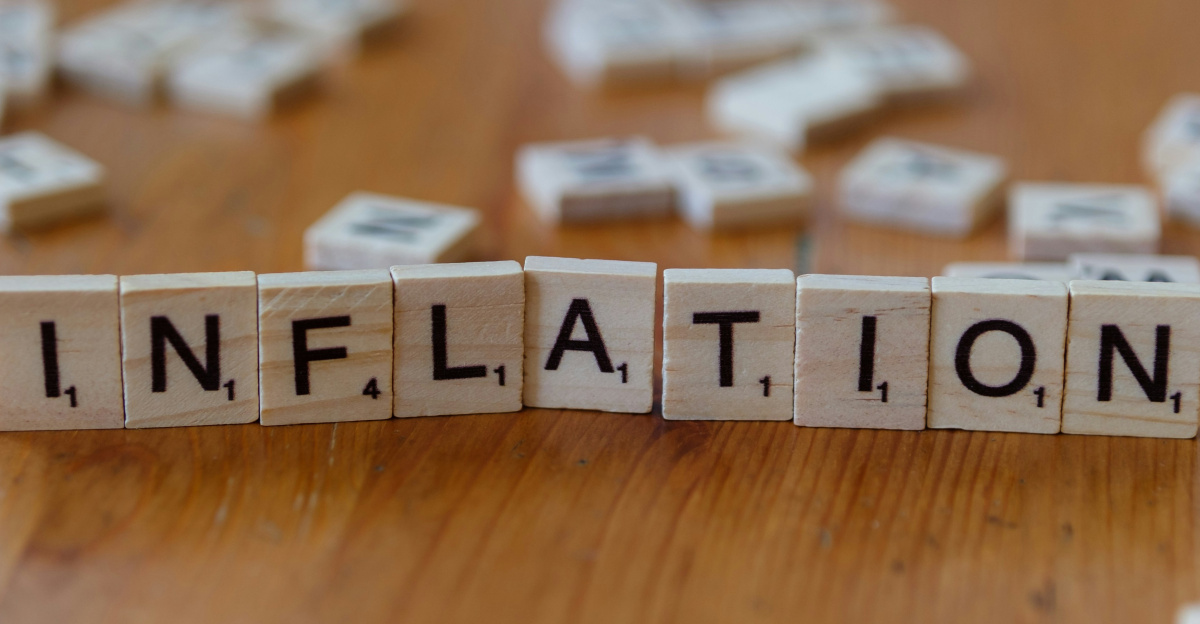 Inflation is spelled out using scrabble tiles.