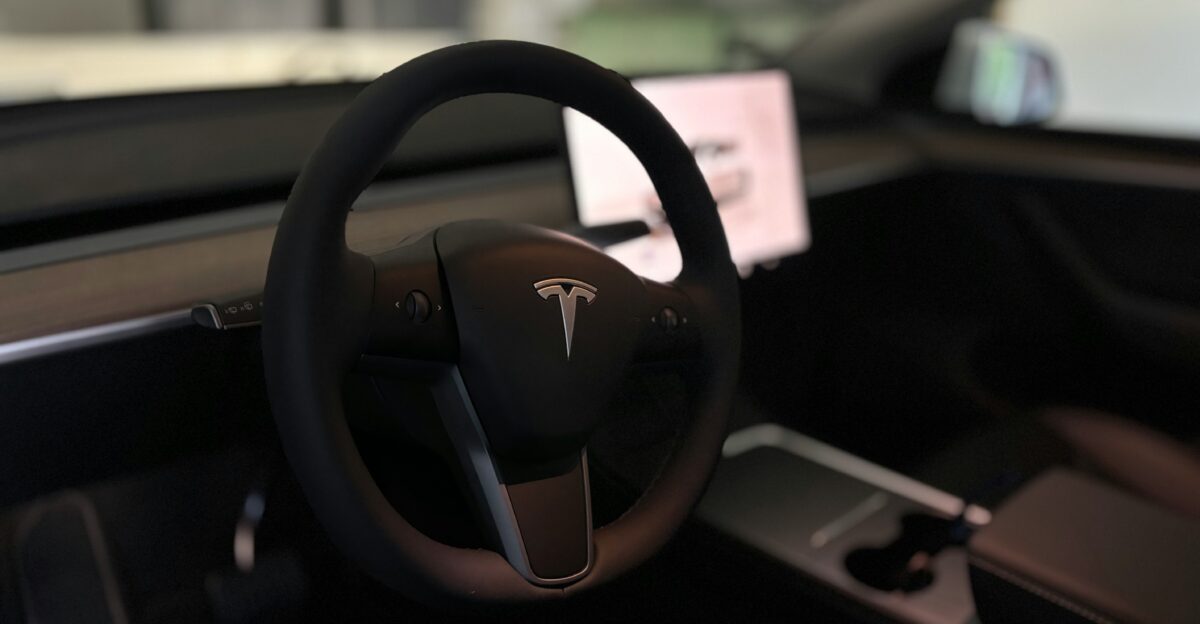 A tesla s steering wheel and interior