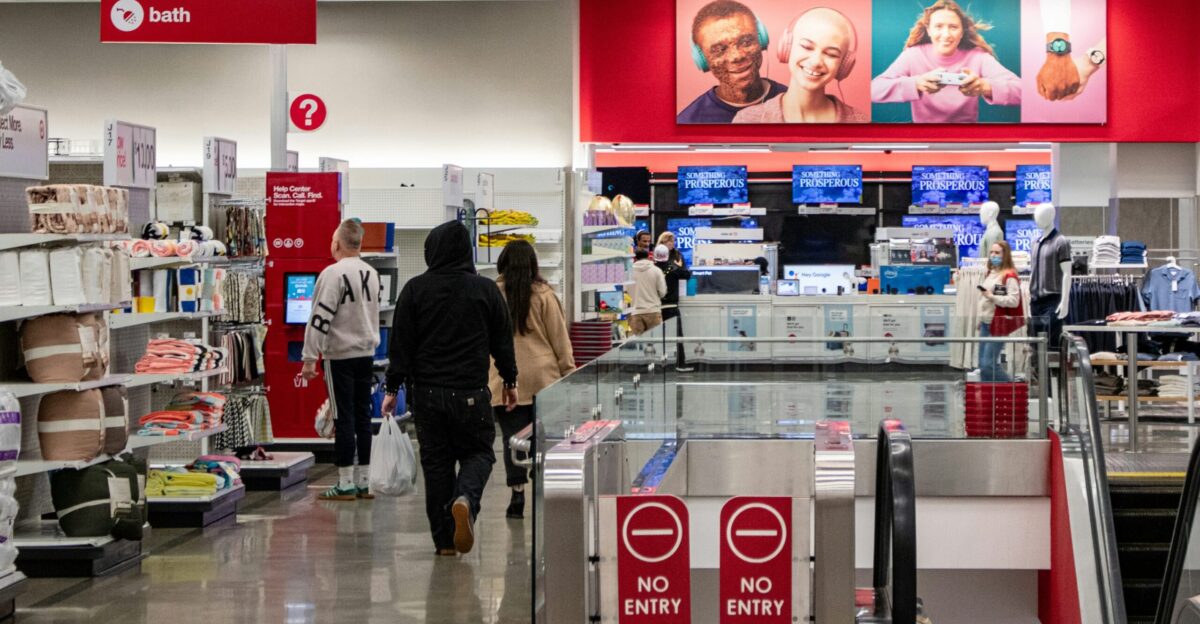 People shop in a target store aisle photo - Free People Image on