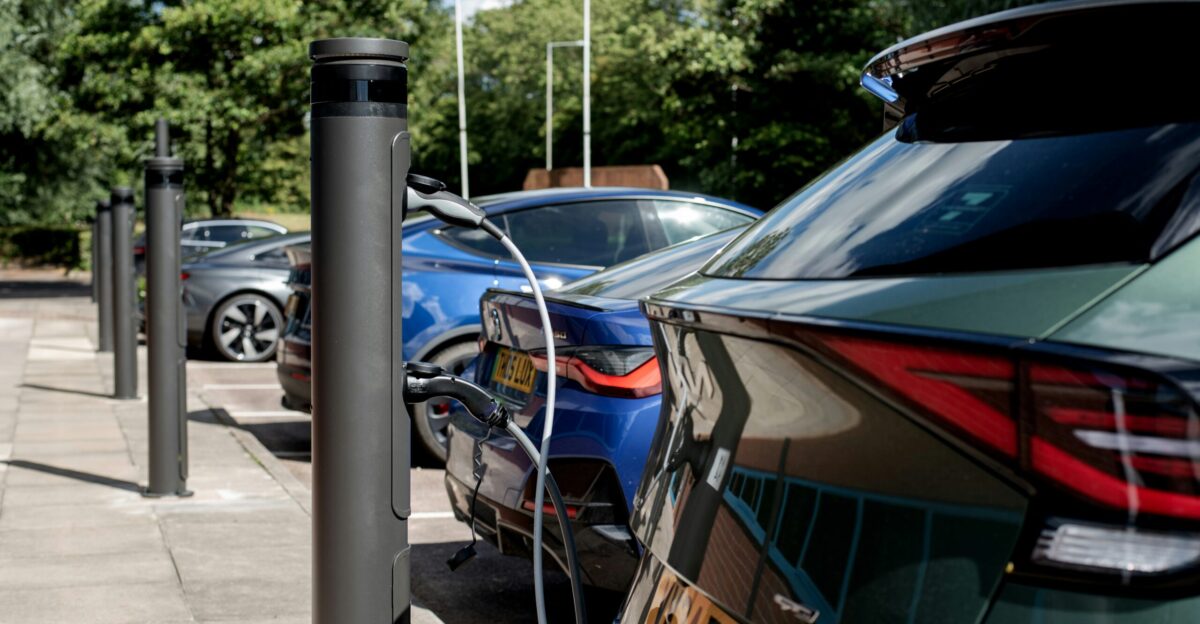 Electric cars are charging at a charging station