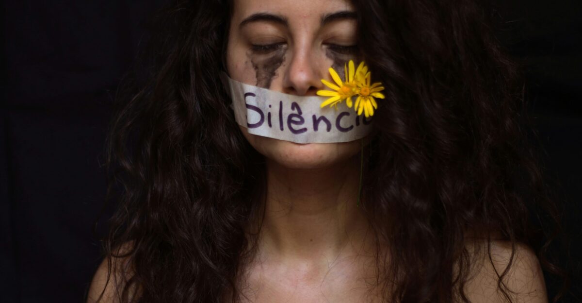 Silence enforced with a flower in the mouth