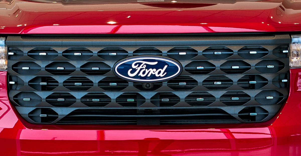 Red ford explorer suv parked indoors