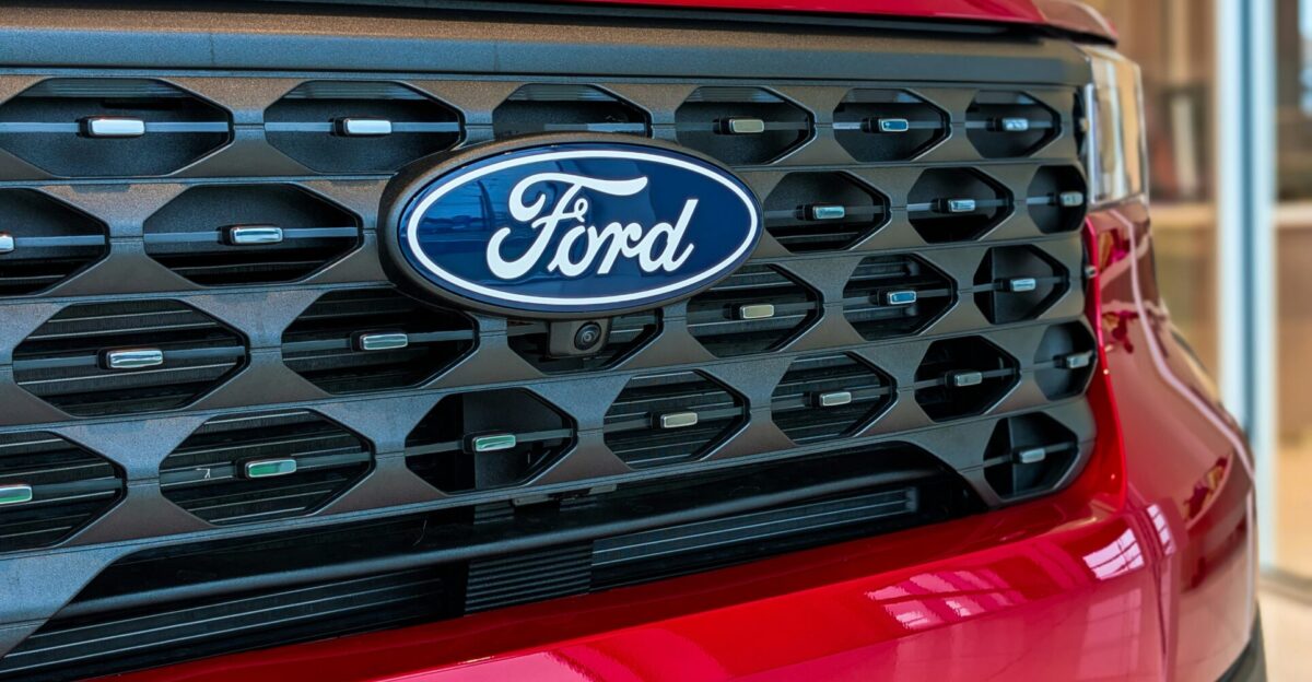 Close-up of a red ford car grille