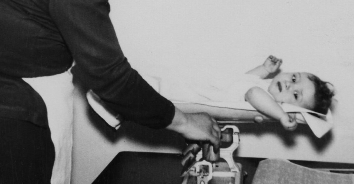<div class="description">
Photograph of a nurse weighing a baby, Clarkesville, Georgia, 1953. This photograph is from a scrapbook submitted to Georgia Power's 1953 Champion Home Town contest. The contest was extended to towns with populations under 20,000. The photos document the town's progress in the areas of education, industry, recreation, youth, clubs and societies, complete with brief written progress reports.</div>