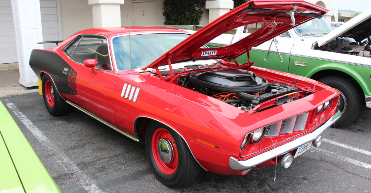 The Plymouth was introduced in 1928 Chryslers lowest priced car In 1971 four different size cars were available The compact A body Valiant 4 door Sedan 2 door Valiant Scamp and 2 door Duster The Intermediate B body Satellite GTX and Road Runner same platform as the Dodge Coronet Super Bee and Charger And the full size C body Fury I II III Sport and Custom Barracudas were built from 1964-74 The first generation built on the Valiant A body platform the 1970-74 second generation built on the new E body Pony car platform Sharing this platform was the Dodge Challenger The 1971 facelift was the only year the Barracuda had 4 headlights Models available in 1971 were The base Barracuda with 145hp 225 Slant 6 230hp 318 V8 or 275hp 340 V8 2 door Hardtop or Convertible The luxury Gran Coupe also 318 2 door Hardtop The performance car was called the Cuda available with 330hp 383 Magnum 375hp 440ci 4-barrel Super Commando 390hp 440 6-barrel Super Commando Six Pak and 425hp 426ci Hemi 2 door Hardtop or Convertible This car also has the optional Shaker Hood option N96