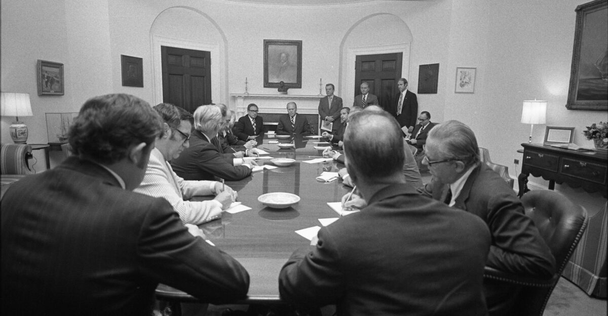 Scope and content This photograph depicts President Gerald R Ford and ambassadors from nations belonging to the North Atlantic Treaty Organization NATO seated around a table in the Roosevelt Room at the White House on the day he was sworn into office Meeting participants include Ambassadors Herman Dehennen of Belgium Marcel Cadieux of Canada Evvind Bartels of Denmark Francois de La Gorce of France Hans H Noebel of Germany Constantine P Panayotacos of Greece Thorsteinn Ingolfsson of Iceland Giulio Tamagnini of Italy Albrecht N Van Aerssen of the Netherlands Harald Svanoe Midttun of Norway Pedro Alves Machado of Portugal Melih Esenbel of Turkey and Peter Ramsbotham of the United Kingdom Secretary of State Henry A Kissinger and State Department officials Helmut Sonnenfeldt and Wells Stabler also attended
