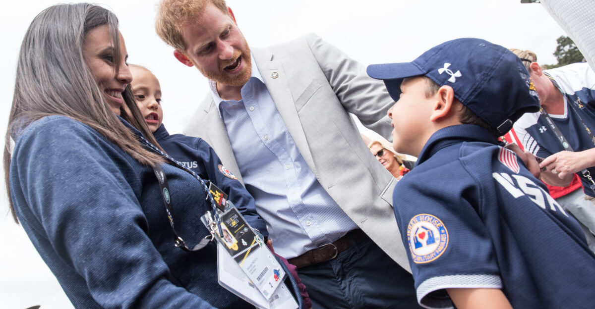 Prince Harry speaks with a Team U S family during the road cycling events of the Invictus Games Sydney 2018 in Sydney New South Wales Australia Oct 21 2018 The Invictus Games are an international adaptive sporting event with current and former wounded ill or injured service members from 18 nations competing in 12 adaptive sports including archery athletics indoor rowing powerlifting road cycling driving challenge sailing sitting volleyball swimming wheelchair basketball wheelchair rugby and wheelchair tennis DoD Photo by U S Army Sgt James K McCann