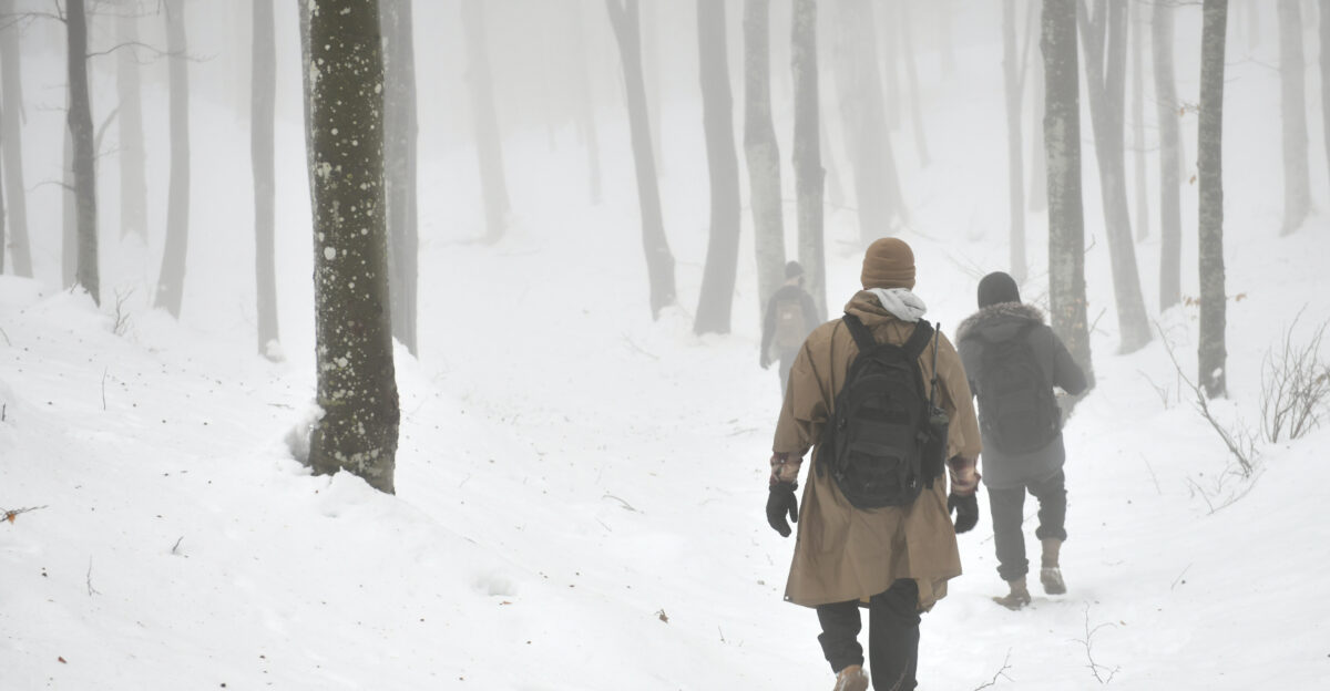 U S Air Force Airman 1st Class Jae Han 31st Munitions Squadron precision guided missiles crew member center walks through the snow in the mountains near Pian Cansiglio Italy Jan 21 2021 Han was part of a four-man search team tasked with locating three simulated survivors during a combat survival training exercise U S Air Force photo by Staff Sgt K Tucker Owen