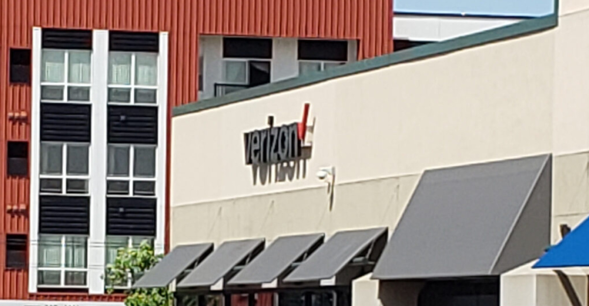 Just north of the Super Target in Hamline-Midway, protesters began to smash windows of nearby shops, including this Verizon store that was smashed moments before this image was captured.