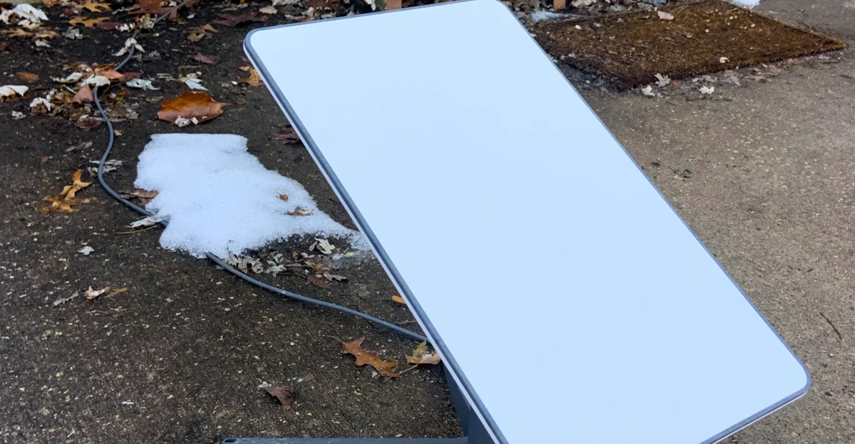 Starlink dish by a residential home