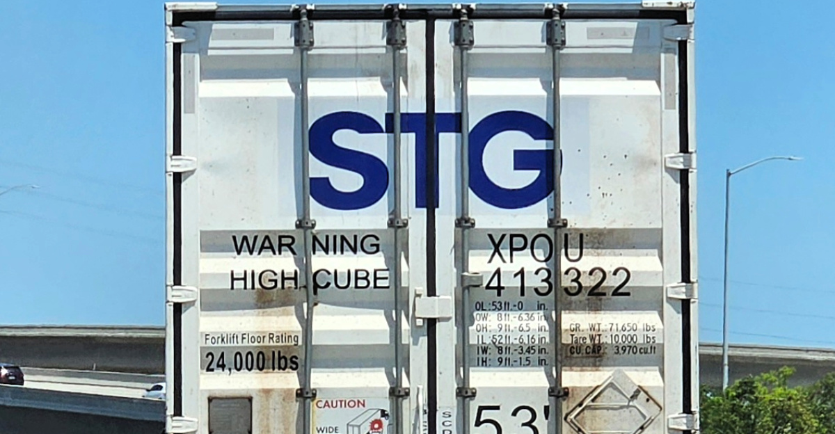 STG logistics container semi-trailer on Interstate 710 in Lynwood, California, USA.