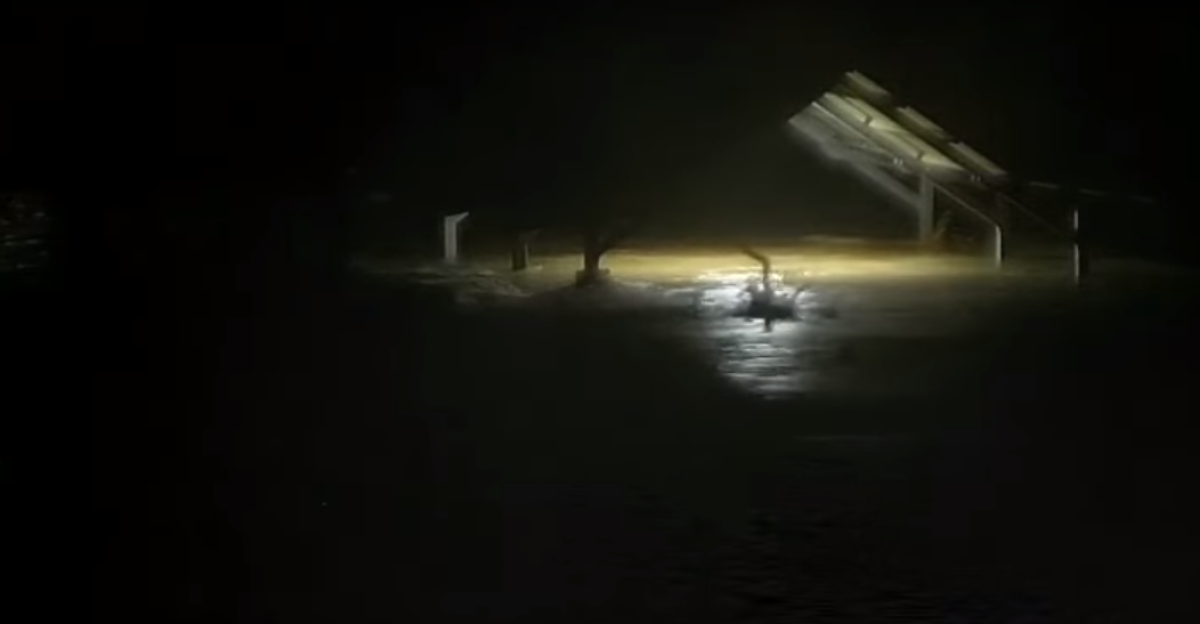 A security camera still of a devastating river surge that killed at least 13 people in Central Texas (seen from Kerrville, Texas) on July 4, 2025. Hundreds remain unaccounted for as of July 4.