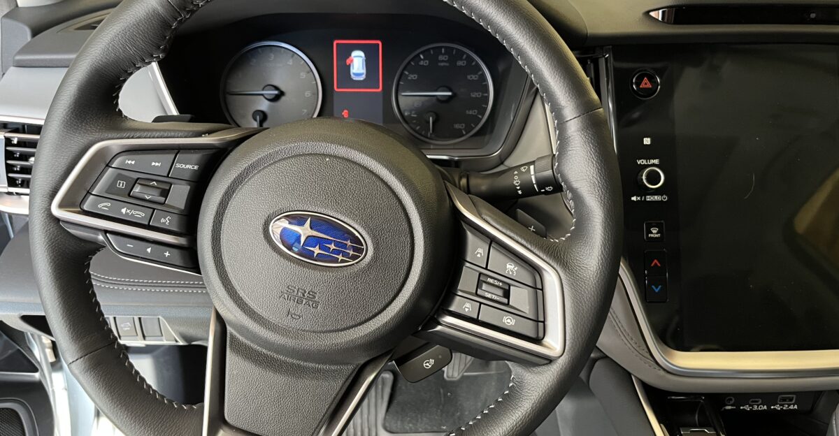 View of the interior dashboard and controls of a 2023 Subaru Outback Limited Imaged in Castle Pines Colorado US
