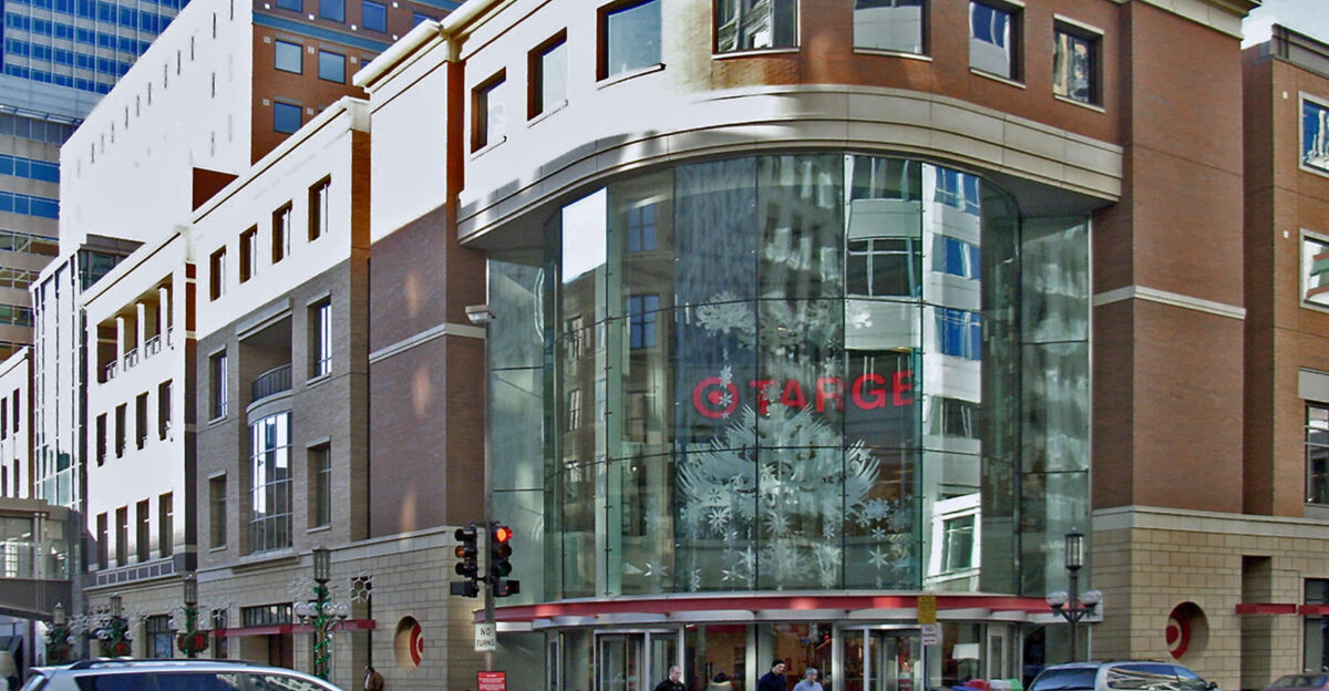 this block houses Target headquarters blue tower and a two level flagship with several entrances at street and second skyway level and a bit of liner retail tucked beneath Layout inside is similar to South Loop a passageway just inside the store but outside the registers runs along the store s short end connecting the entrances along Nicollet