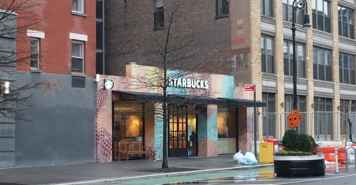 Looking at the Starbucks a former Papyrus NIQUEA D greeting card store at the southeast corner of 14th Street and Hudson Street in the Meatpacking District Manhattan In addition to its colorful facade it is located a block away from another Starbucks in 61 Ninth Avenue
