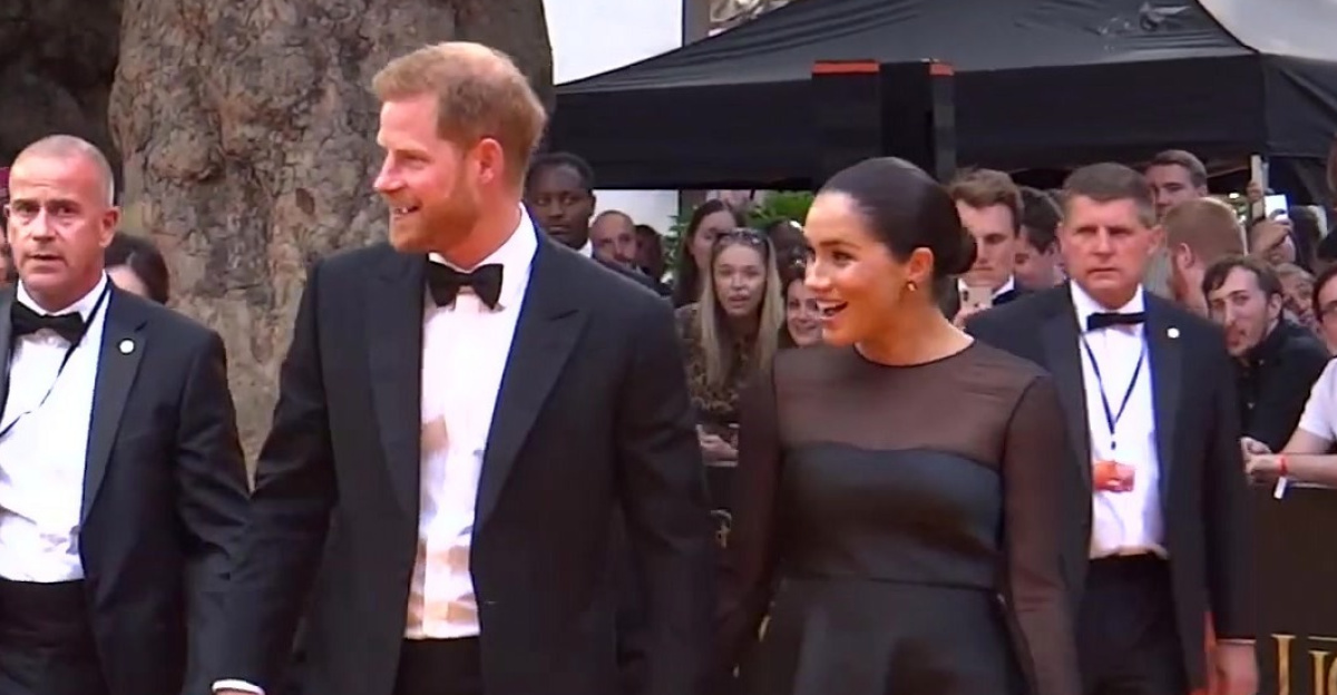 <a href="//commons.wikimedia.org/wiki/Prince_Harry,_Duke_of_Sussex" title="Prince Harry, Duke of Sussex">Prince Harry, Duke of Sussex</a> and <a href="//commons.wikimedia.org/wiki/Meghan,_Duchess_of_Sussex" title="Meghan, Duchess of Sussex">Meghan, Duchess of Sussex</a> attending to the European Premiere of the American musical drama film <i>The Lion King</i>.
