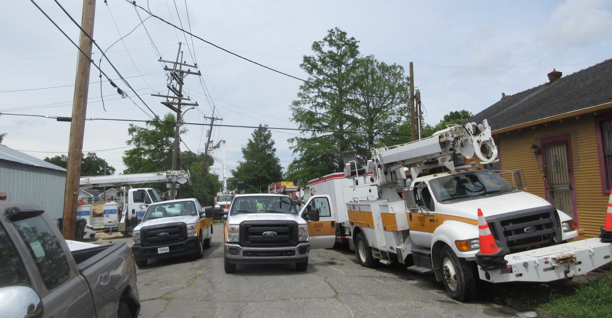 A tornado hit this area of New Orleans about 2:30 am. About 12 hours later I was able to go by the area near Cohn & Pine Streets where one of the tornado touchdowns happened. The worst hit areas were still blocked off. Lots of workers cleaning up and redoing power lines.