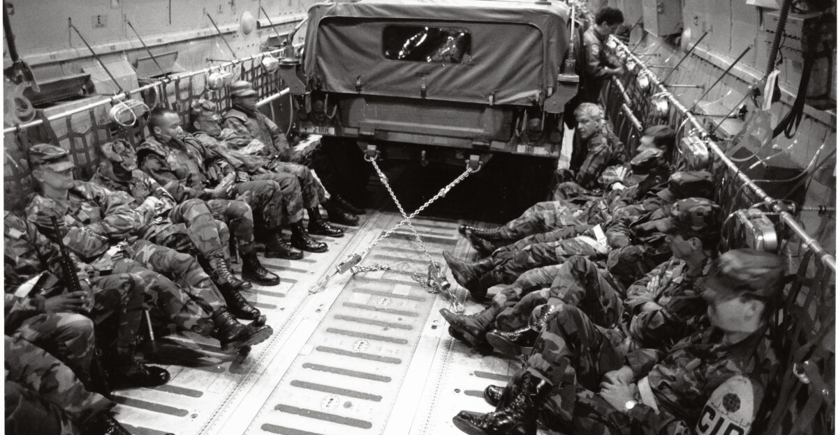 Twenty years ago May 1 1992 President George H W Bush sent federal troops to Los Angeles to help stop the rioting sparked by the acquittal of cops who beat down Rodney King I was on one of these C-141s now retired flying troops from Fort Ord Calif now closed to Marine Corps Air Station El Toro now closed Never thought I d see such a thing in my own country let alone California Still find every element of this story to be hard to understand Shot on Tri-X pushed to 1600 Nikon F3HP Nikkor 24 2 Exposure guestimate f2 at 1 8 sec 141s had dim lighting Much of the power was out in LA from the air you could see the fires burning for miles Soldiers from the 7th ID aircrew from the 710 ALS One of the saddest moments of my life en wikipedia org wiki 1992 Los Angeles riots en wikipedia org wiki Posse Comitatus Act