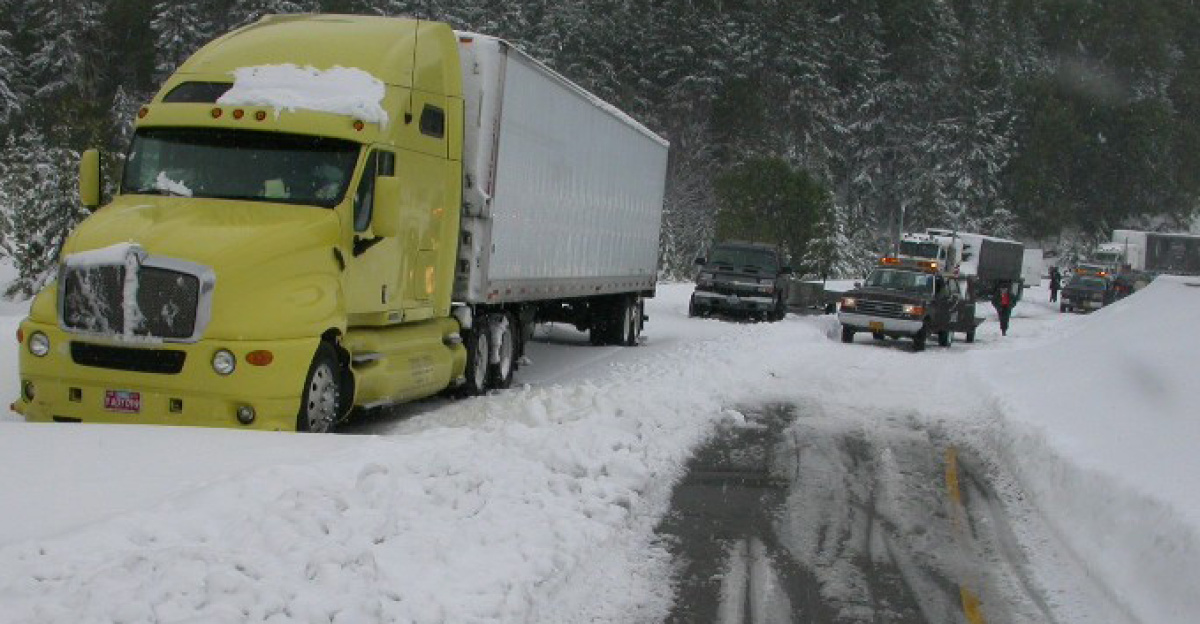 A truck gets stuck in heavy snow in Oregon.