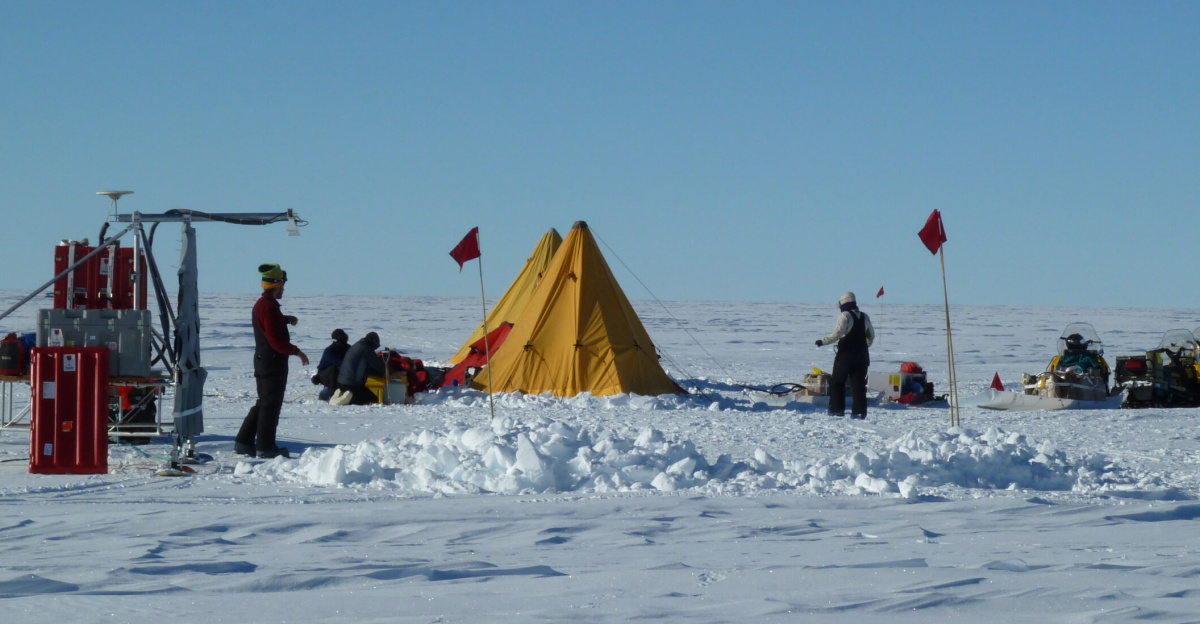 <p>On Dec. 10, 2010, the science team set up one of four campsites used during the Antarctic traverse. The team usually spent two nights at each site – arriving after a day of collecting radar data and staying another day to drill an ~15 m ice core. 
</p>
The traverse was the first of two field campaigns to study snow accumulation on the West Antarctic Ice Sheet and tie the information back to larger-scale data collected from satellites. Credit: NASA/Lora Koenig