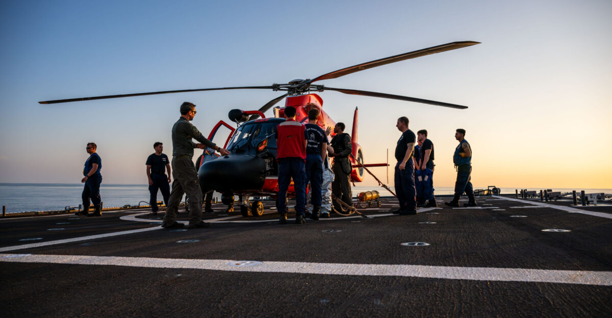 Lt Tevin Porter-Perry an MH-65 Dolphin helicopter pilot from the Helicopter Interdiction Tactical Squadron HITRON demonstrates the aircraft s capabilities to U S Coast Guard Cutter Kimball WMSL 756 crewmembers while patrolling the Eastern Pacific Ocean March 7 2025 Based in Jacksonville Florida expertly trained HITRON pilots and precision marksmen are specialists in intercepting drug smugglers on the high seas using the helicopter before smugglers can enter the U S U S Coast Guard photo by Petty Officer 3rd Class Austin Wiley