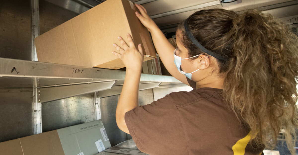 UPS Pre-Loader Elizabeth Reid loads a food box onto a delivery van to deliver needed food of the U S Department of Agriculture USDA Food and Nutrition Service FNS Meals to You program that responded to the school closures due to COVID-19 here one of the partners PepsiCo implemented a logistics solution that utilizes package delivery company UPS to get multi-week supplemental food boxes to children in rural locations such as Natalia TX on August 24 2020 USDA first began the Meals to You program in 2019 as a three-year demonstration project designed to test a method to deliver nutritious food to children during the summer months in rural areas where the Summer Food Service Program SFSP is not available to difficult to access USDA entered into an agreement with Baylor University s Texas Hunger Initiative now called the Baylor Collaborative on Hunger and Poverty for the original demonstration In response to COVID-19 USDA and its partners were able to leverage the summer demonstration project to ensure rural children had access to food during pandemic-related school closures The Emergency Meals to You demonstration project continues our public-private partnership with the Baylor Collaborative on Hunger and Poverty and McLane Global that began in Summer 2019 and additionally includes Pepsi Co and Chartwells USDA was able to fund this expansion utilizing funding provided by the CARES Act Overall we allocated 185 million for the program from the 8 8 billion that the CARES Act provided for Child Nutrition Meals to You boxes are delivered directly to children s homes via the U S Postal Service or another delivery service Each box contains 20 nutritious shelf-stable meals including ten breakfasts and ten lunches suppers In participating states families with students who attend an eligible school or are eligible for free or reduced-price meals may opt-in to receive one box per child every two weeks The original goal was to serve 1 million meals per week which was quickly surpassed The partnership is now serving around 5 million meals per week For more information about the 1 000 000 meals a week program partnership please visit usda gov media press-releases 2020 03 17 usda-announces-feeding-program-partnership-response-covid-19 For more information about FNS Program Guidance on Human Pandemic Response please visit fns usda gov disaster pandemic For additional information and photos please visit the album and see its description flic kr s aHsmQ3GddJ flic kr s aHsmPrXwEi flic kr s aHsmMdK2x3 USDA Media by Lance Cheung