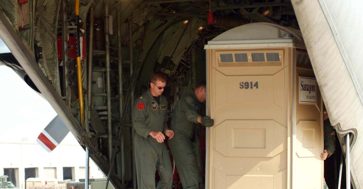 Fort Worth Texas Sept 3 2005 - U S Navy personnel assigned to Fleet Logistic Support Squadron Five Five VR-55 load their C-130 Hercules aircraft with portable restrooms and other supplies to be delivered to New Orleans and surrounding areas in the wake of much needed sanitation requirements VR-55 is stationed at Naval base Ventura County Calif The Navy s involvement in the Hurricane Katrina humanitarian assistance operations is led by the Federal Emergency Management Agency FEMA in conjunction with the Department of Defense U S Navy photo by Photographer s Mate 1st Class Andrew Rutigliano RELEASED
